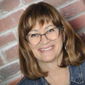 A headshot photo of ​​​​​​​Jeannette Aschenbrenner