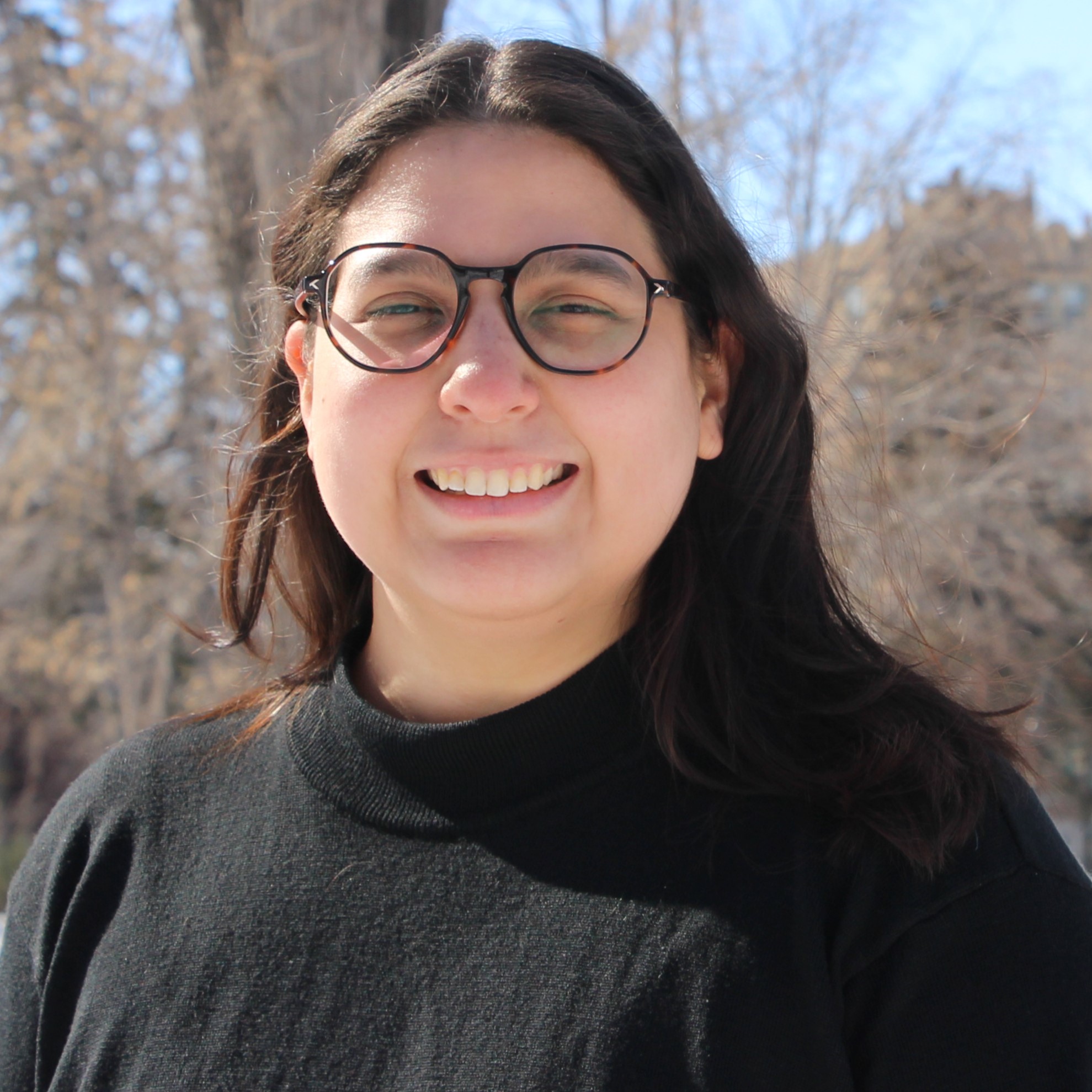 A headshot photo of Ana Cristina Camacho.
