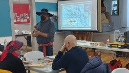 Three people attending a workshop in the Chinook Regional Library in Swift Current.