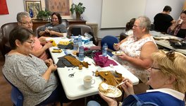 A photo of Kinistino area residents at the moccasin-making workshop.
