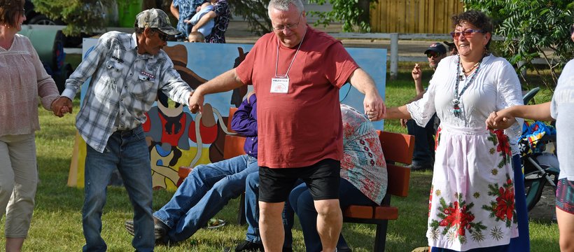 A photo of Jasper Culture and Historical Centre volunteer Donny White taking part in a round dance.