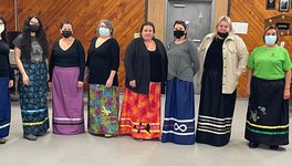 Participants model the diversity of their completed ribbon skirts. Photo by Tracy Tinker