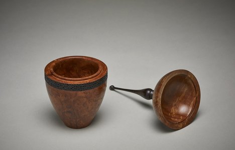A wooden vessel entitled "Finial Finale" by Dave Dunkley.
