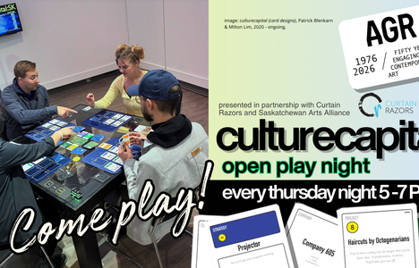 Four people sit at a table playing a came with cards in their hands and other game pieces on the table