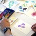 Photo of someone painting watercolor