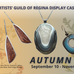 On a grey to gold gradient background there are 4 jewellery items, a pair of square blue metal earrings, an oval striped stone pendant, a pair of long triangular pink stone earrings, and a copper leaf necklace.