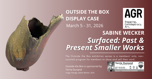 a ceramic vessel in an organic vase shape, which leans to the left with a ragged top edge in gold and deep red earth hues.