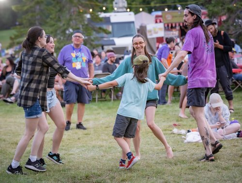 Group dancing and enjoying the music at Sask Jazz Fest.