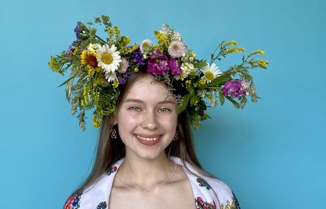image of a woman wearing a vinok (Ukrainian flower crown)