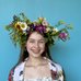 image of a woman wearing a vinok (Ukrainian flower crown)