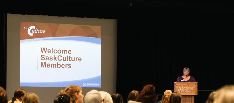 People gather at a meeting