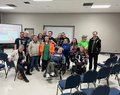 A group photo of Listen to Dis' performers on a tour stop in Humboldt.
