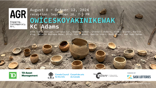 three photographs of people making clay pots are on the gallery wall pieced together to create cross patterns and overlaid with a starblanket design. In the foreground, many clay pots and other ceramic items are placed in a canoe-shaped pile of ash