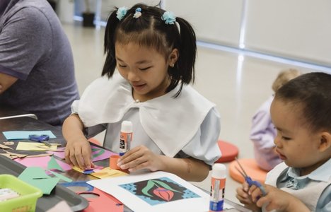 Youth participate in art making at a past WEGO.