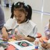 Youth participate in art making at a past WEGO.