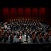Photo of a orchestra preforming.