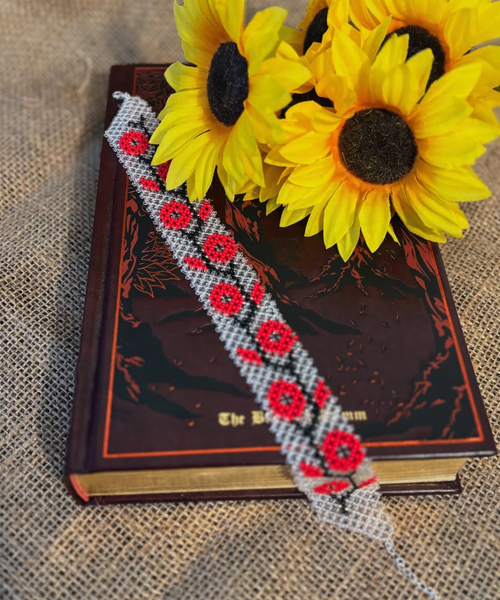 image of white Ukrainian beaded bracelet with red flowers