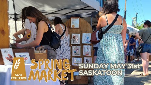 picture of an outdoor market scene with women in sundresses looking at a booth with art prints