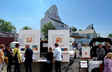 Artist concept of inaugural Tailgate Art Fair Val Marie Saskatchewan August 9 2026 showing art and craft makers and their vehicle displays in front of a heritage elevator