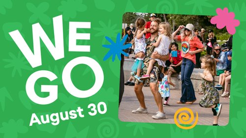 WEGO attendees dance in the river landing amphitheater.