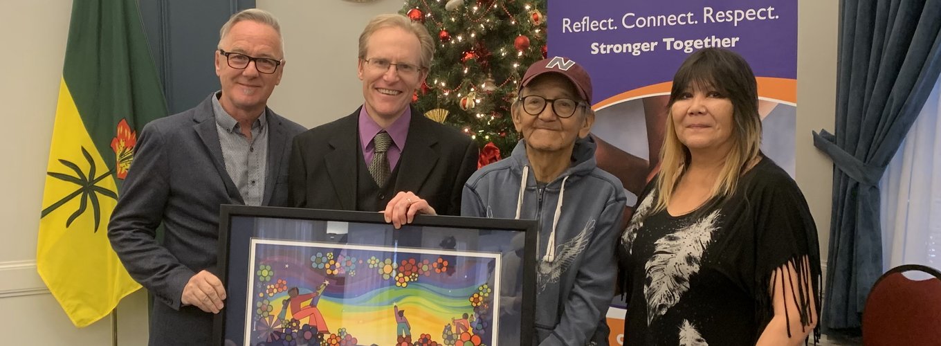 We Treaty People artists Darryl Dozlaw, Stephen Waldschmidt, Erroll Kinistino, and Josie Linka receiving the Leading Together Award for Burnt Thicket Theatre