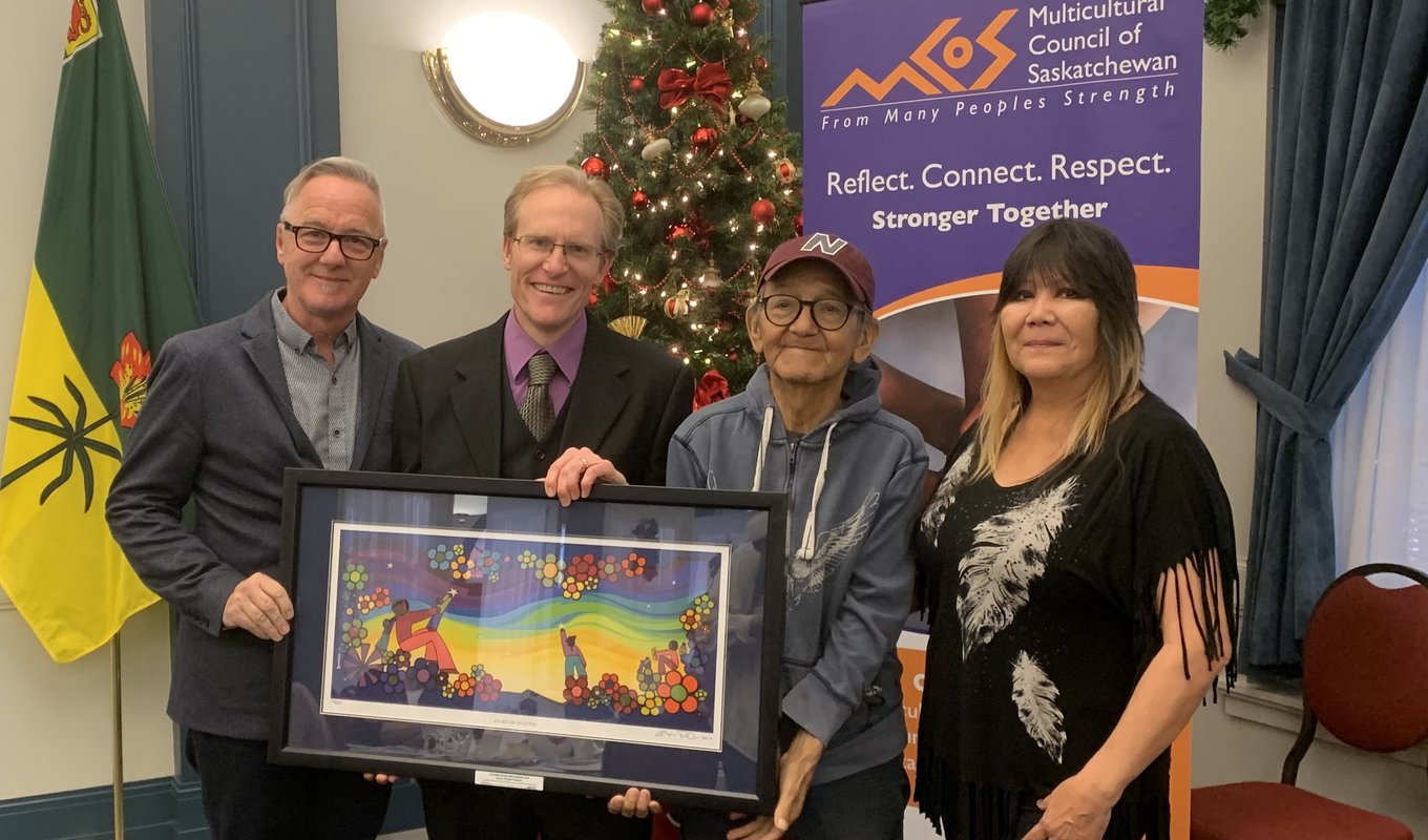 We Treaty People artists Darryl Dozlaw, Stephen Waldschmidt, Erroll Kinistino, and Josie Linka receiving the Leading Together Award for Burnt Thicket Theatre