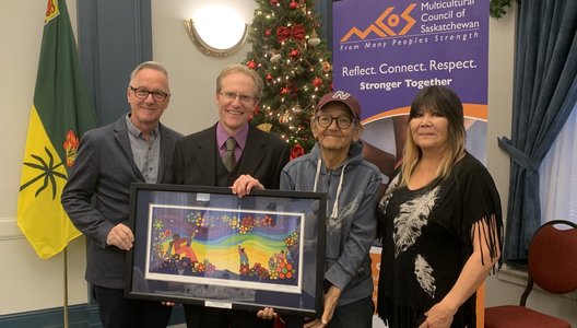 We Treaty People artists Darryl Dozlaw, Stephen Waldschmidt, Erroll Kinistino, and Josie Linka receiving the Leading Together Award for Burnt Thicket Theatre.