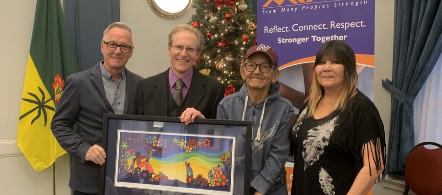We Treaty People artists Darryl Dozlaw, Stephen Waldschmidt, Erroll Kinistino, and Josie Linka receiving the Leading Together Award for Burnt Thicket Theatre.