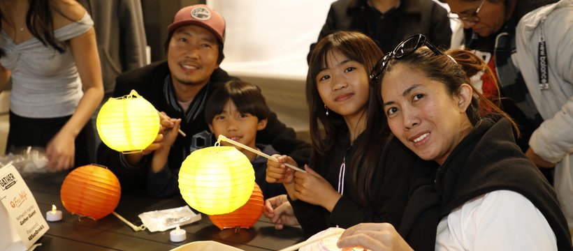 A family making lanterns