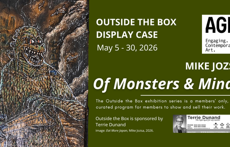 A piece of antique wood has been carved and painted to show Godzilla, emerging from the sea and holding a ship.