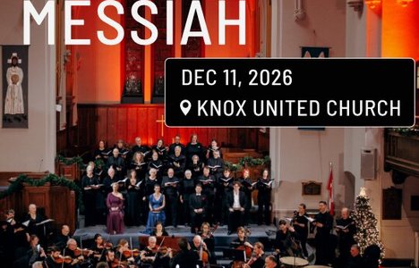 Photo of a choir and orchestra performing in a church.