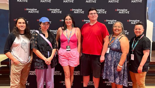 A group photo of the Buffalo Futurism team at the Toronto imagineNATIVE Film + Media Arts Festival red carpet.