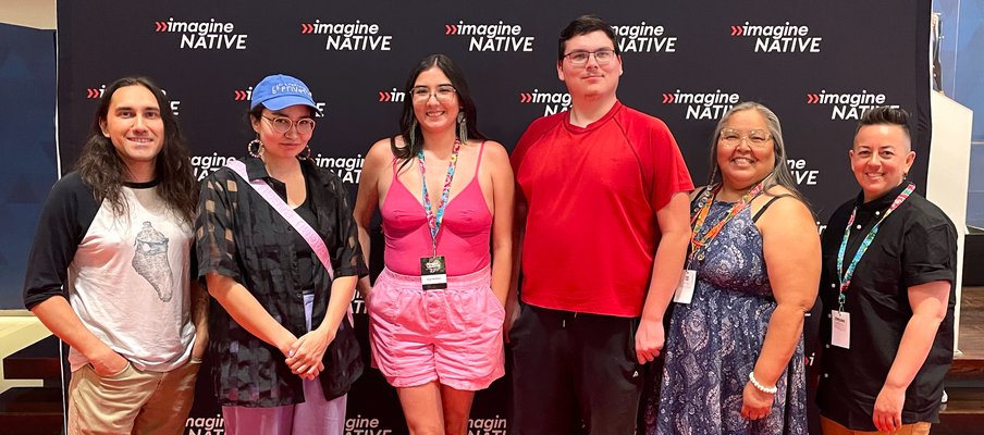 A group photo of the Buffalo Futurism team at the Toronto imagineNATIVE Film + Media Arts Festival red carpet.