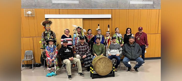 A group photo of people at an Indigenous Storytelling Month event.